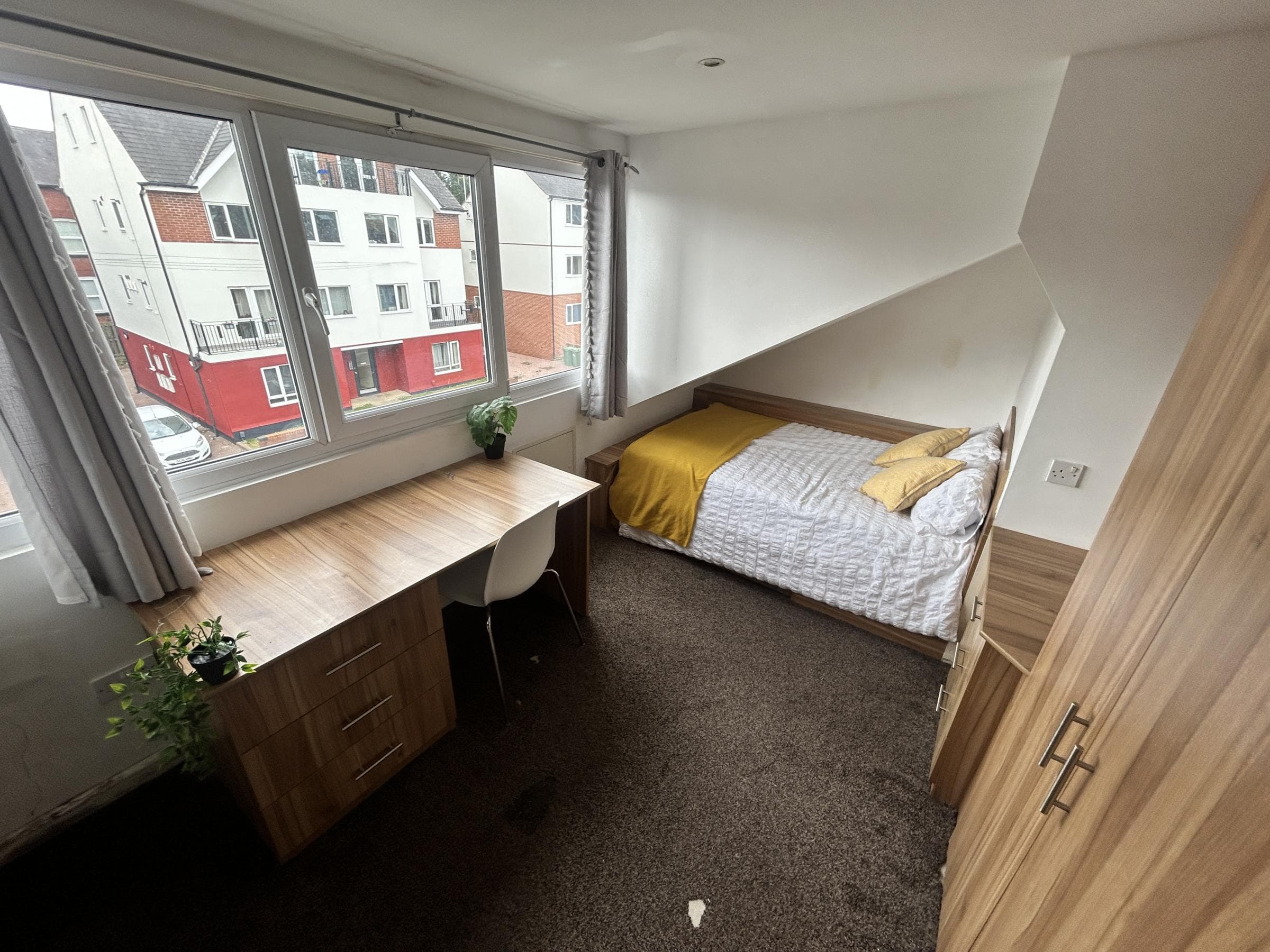 Attic bedroom with desk